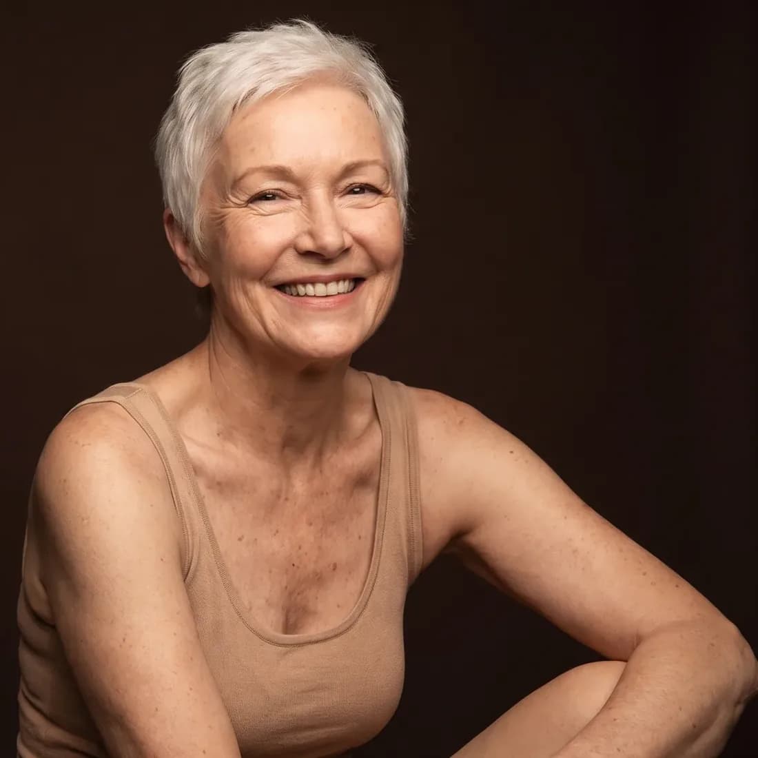Woman with a relaxed smile, lips at rest, natural skin