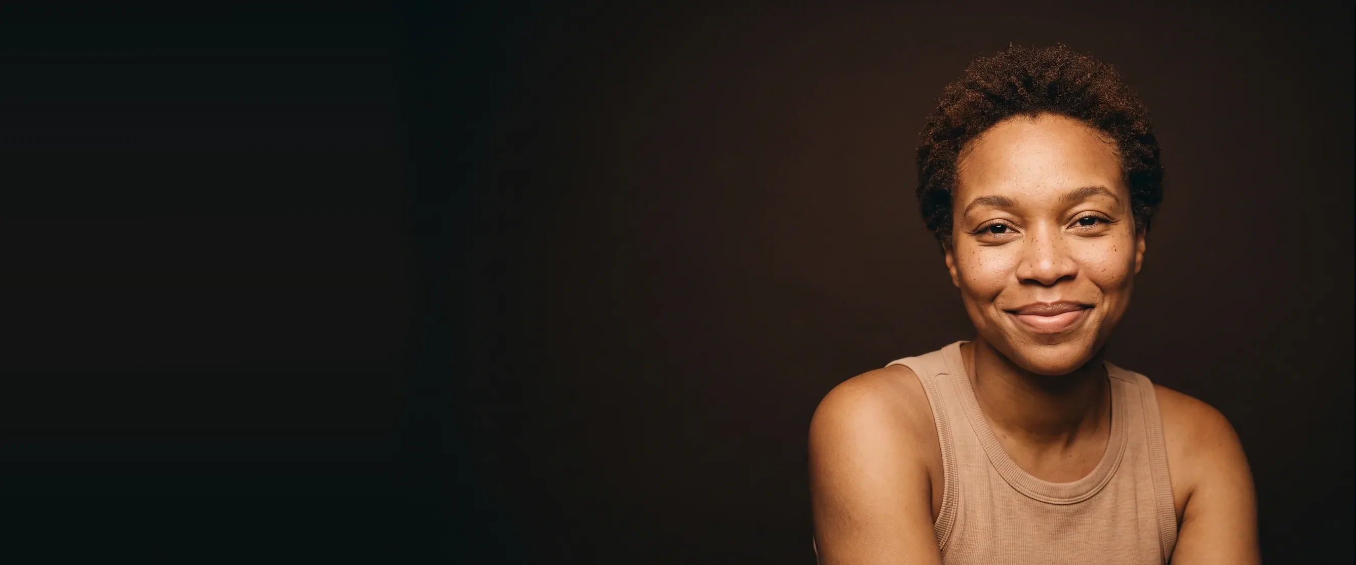 A woman with a natural smile, the lip line clearly drawn